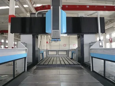 ماكينة حفر وتفريز CNC جسرية (جسر ثابت وطاولة متحركة)